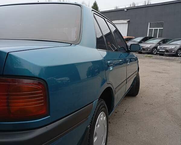 Синий Мазда 323, объемом двигателя 1.6 л и пробегом 159 тыс. км за 3000 $, фото 4 на Automoto.ua