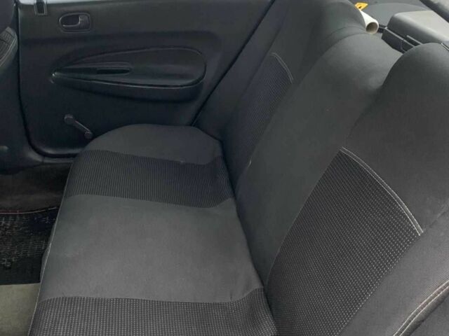 Синий Мазда 323, объемом двигателя 1.5 л и пробегом 419 тыс. км за 2500 $, фото 4 на Automoto.ua