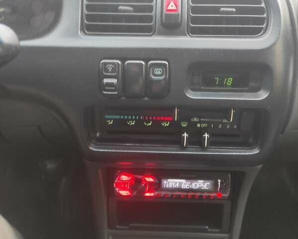 Синий Мазда 323, объемом двигателя 1.5 л и пробегом 295 тыс. км за 2300 $, фото 3 на Automoto.ua