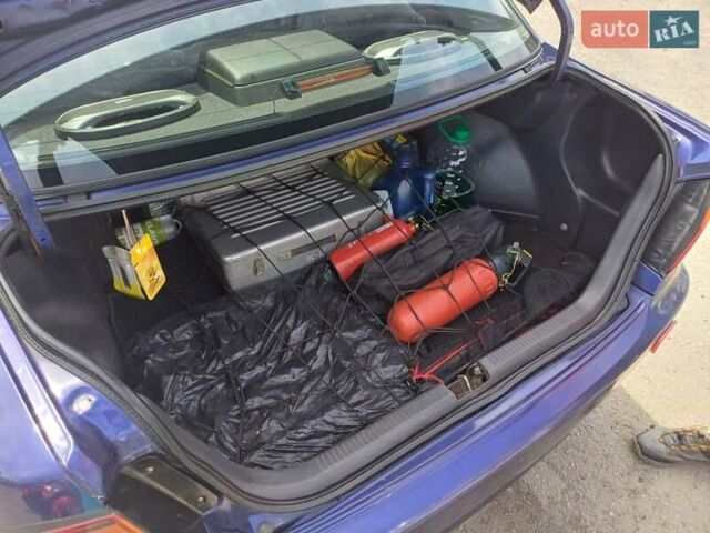 Синий Мазда 323, объемом двигателя 1.5 л и пробегом 295 тыс. км за 2300 $, фото 18 на Automoto.ua