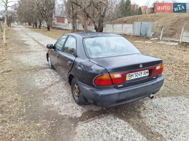 Синий Мазда 323, объемом двигателя 1.49 л и пробегом 595 тыс. км за 1250 $, фото 6 на Automoto.ua