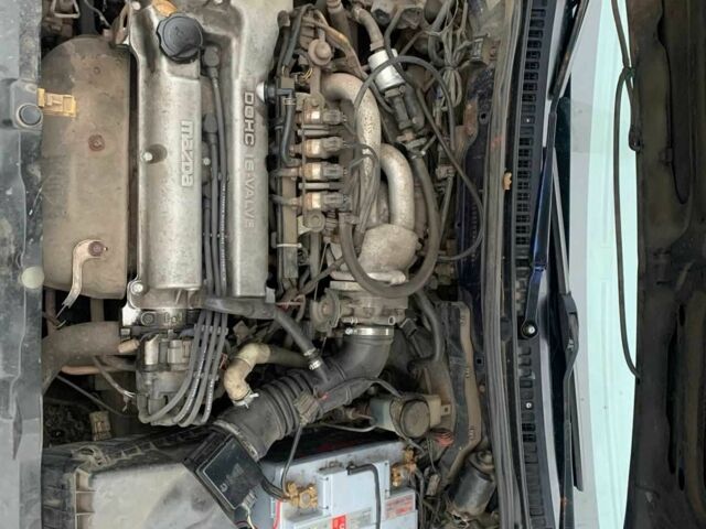 Синий Мазда 323, объемом двигателя 1.5 л и пробегом 419 тыс. км за 2500 $, фото 1 на Automoto.ua