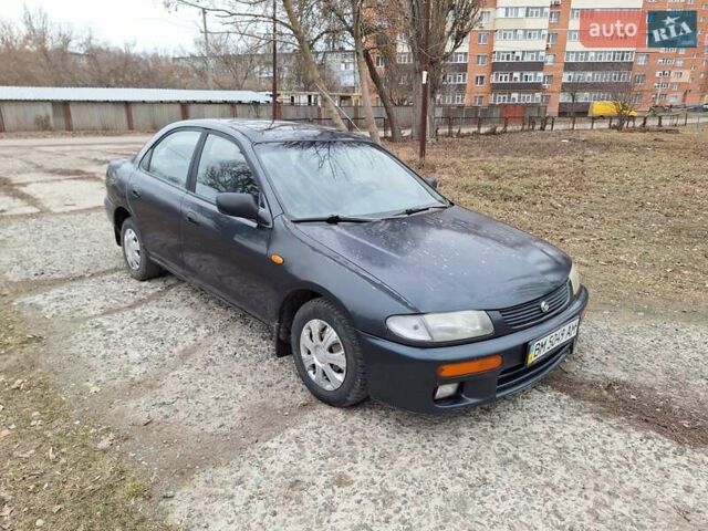 Синий Мазда 323, объемом двигателя 1.49 л и пробегом 595 тыс. км за 1250 $, фото 8 на Automoto.ua