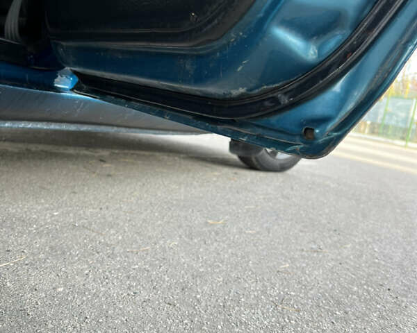 Синий Мазда 323, объемом двигателя 1.6 л и пробегом 250 тыс. км за 1900 $, фото 11 на Automoto.ua