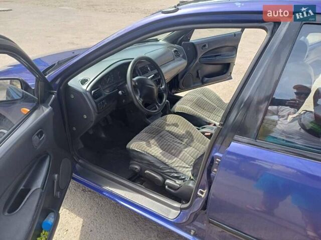 Синий Мазда 323, объемом двигателя 1.5 л и пробегом 295 тыс. км за 2300 $, фото 20 на Automoto.ua