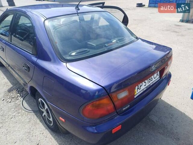 Синий Мазда 323, объемом двигателя 1.5 л и пробегом 295 тыс. км за 2300 $, фото 17 на Automoto.ua