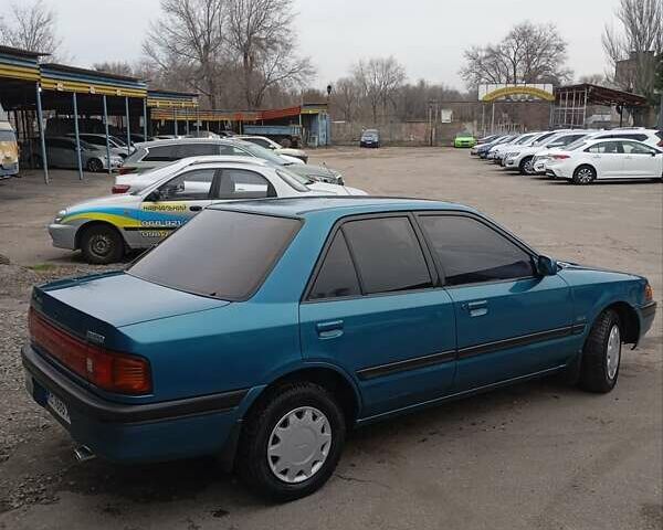 Синий Мазда 323, объемом двигателя 1.6 л и пробегом 159 тыс. км за 3000 $, фото 5 на Automoto.ua