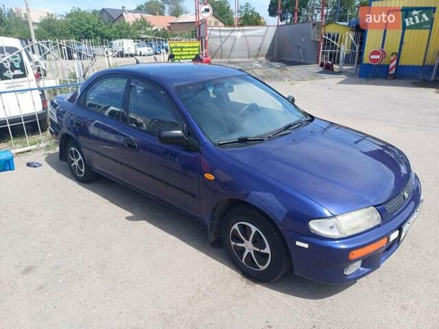 Синий Мазда 323, объемом двигателя 1.5 л и пробегом 295 тыс. км за 2300 $, фото 10 на Automoto.ua