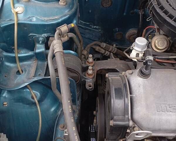 Синий Мазда 323, объемом двигателя 1.6 л и пробегом 159 тыс. км за 3000 $, фото 23 на Automoto.ua