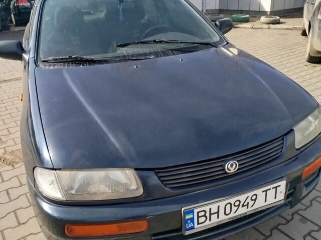 Синий Мазда 323, объемом двигателя 0 л и пробегом 287 тыс. км за 1700 $, фото 3 на Automoto.ua