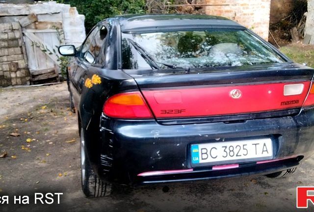 Синій Мазда 323, об'ємом двигуна 1.5 л та пробігом 454 тис. км за 1350 $, фото 1 на Automoto.ua