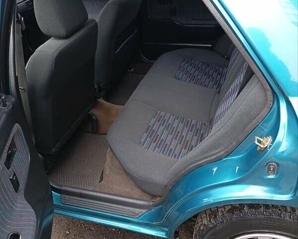 Синий Мазда 323, объемом двигателя 1.6 л и пробегом 159 тыс. км за 3000 $, фото 11 на Automoto.ua