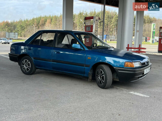 Синий Мазда 323, объемом двигателя 1.6 л и пробегом 250 тыс. км за 1900 $, фото 4 на Automoto.ua