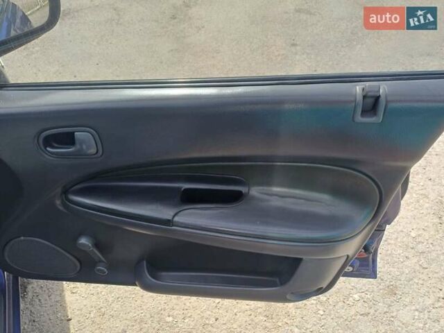 Синий Мазда 323, объемом двигателя 1.5 л и пробегом 295 тыс. км за 2300 $, фото 14 на Automoto.ua