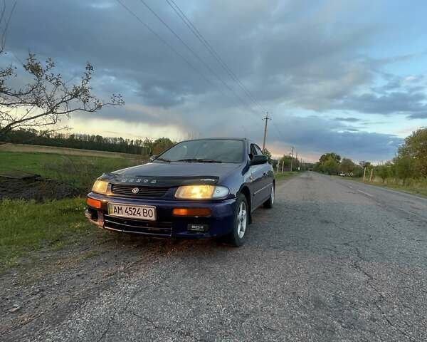 Синий Мазда 323, объемом двигателя 1.5 л и пробегом 380 тыс. км за 1400 $, фото 9 на Automoto.ua