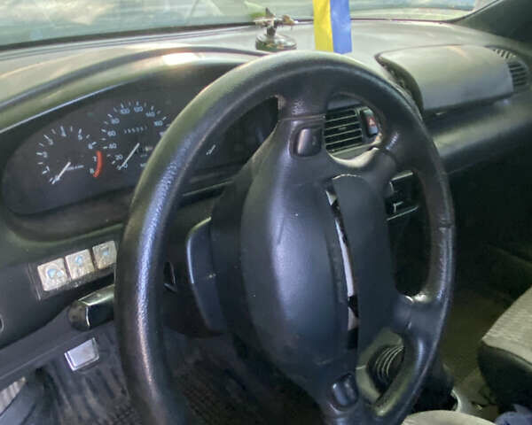 Синій Мазда 323, об'ємом двигуна 1.3 л та пробігом 395 тис. км за 1750 $, фото 6 на Automoto.ua