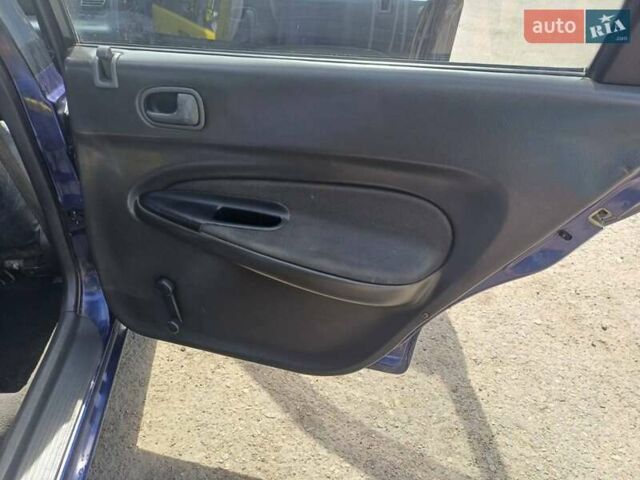 Синий Мазда 323, объемом двигателя 1.5 л и пробегом 295 тыс. км за 2300 $, фото 12 на Automoto.ua