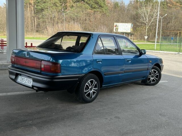 Синий Мазда 323, объемом двигателя 1.6 л и пробегом 250 тыс. км за 1900 $, фото 4 на Automoto.ua