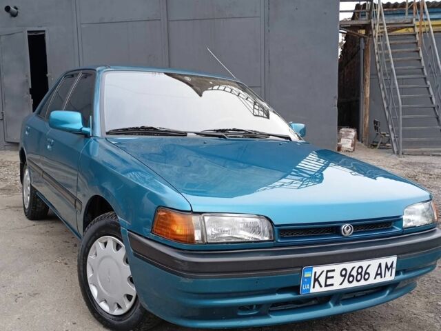 Синий Мазда 323, объемом двигателя 1.6 л и пробегом 160 тыс. км за 3000 $, фото 4 на Automoto.ua