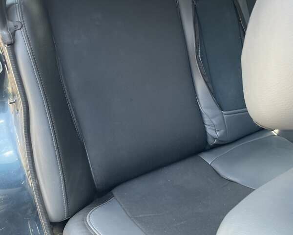 Синий Мазда 323, объемом двигателя 1.49 л и пробегом 415 тыс. км за 2000 $, фото 7 на Automoto.ua