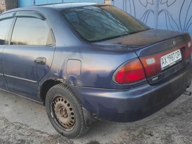 Синий Мазда 323, объемом двигателя 1.8 л и пробегом 350 тыс. км за 1600 $, фото 3 на Automoto.ua