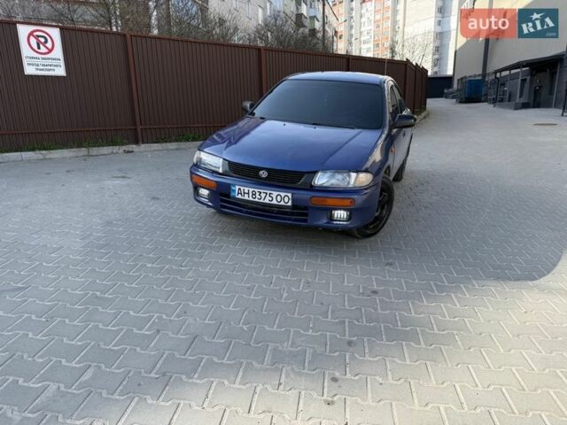 Синий Мазда 323, объемом двигателя 1.5 л и пробегом 267 тыс. км за 1650 $, фото 22 на Automoto.ua