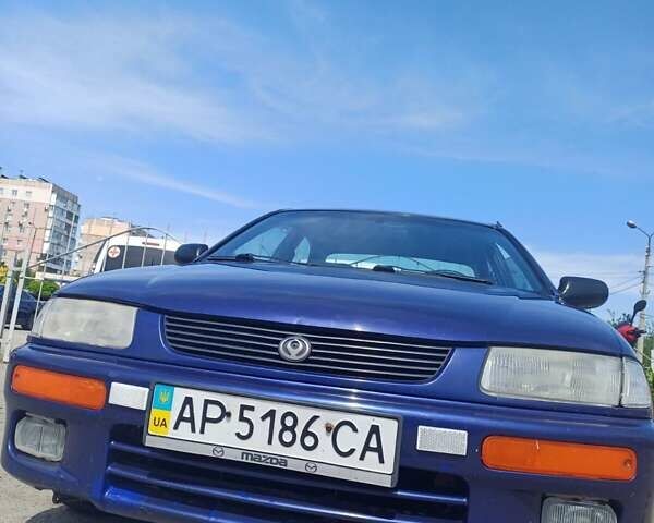 Синий Мазда 323, объемом двигателя 1.5 л и пробегом 295 тыс. км за 2300 $, фото 8 на Automoto.ua