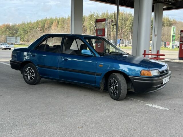 Синий Мазда 323, объемом двигателя 1.6 л и пробегом 250 тыс. км за 1900 $, фото 5 на Automoto.ua