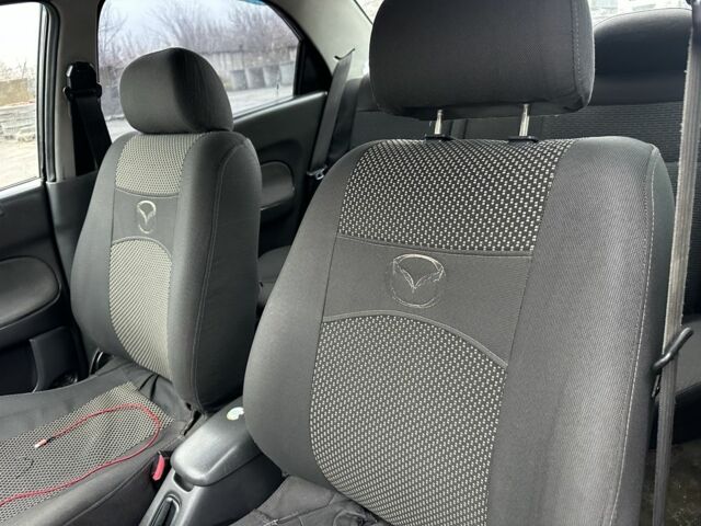 Синий Мазда 323, объемом двигателя 1.5 л и пробегом 399 тыс. км за 1550 $, фото 12 на Automoto.ua