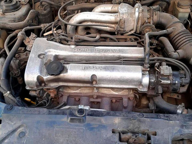 Синий Мазда 323, объемом двигателя 1.5 л и пробегом 402 тыс. км за 2500 $, фото 3 на Automoto.ua