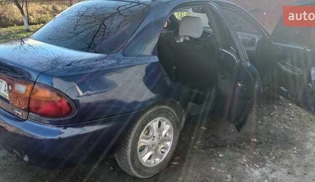 Синий Мазда 323, объемом двигателя 1.5 л и пробегом 400 тыс. км за 1300 $, фото 9 на Automoto.ua