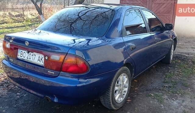 Синий Мазда 323, объемом двигателя 1.5 л и пробегом 400 тыс. км за 1300 $, фото 8 на Automoto.ua