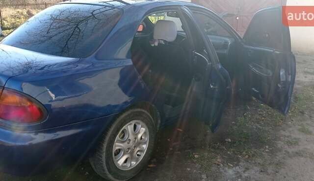 Синий Мазда 323, объемом двигателя 1.5 л и пробегом 400 тыс. км за 1300 $, фото 10 на Automoto.ua