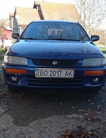 Синий Мазда 323, объемом двигателя 1.5 л и пробегом 400 тыс. км за 1300 $, фото 7 на Automoto.ua