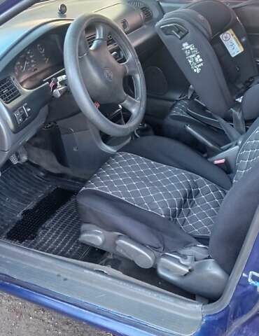 Синий Мазда 323, объемом двигателя 1.5 л и пробегом 400 тыс. км за 1300 $, фото 2 на Automoto.ua