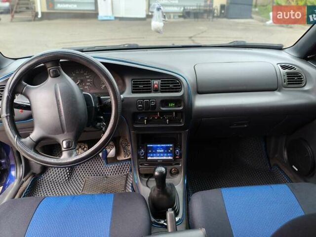 Синий Мазда 323, объемом двигателя 1.5 л и пробегом 342 тыс. км за 2600 $, фото 8 на Automoto.ua