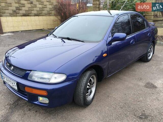 Синий Мазда 323, объемом двигателя 1.5 л и пробегом 342 тыс. км за 2600 $, фото 1 на Automoto.ua