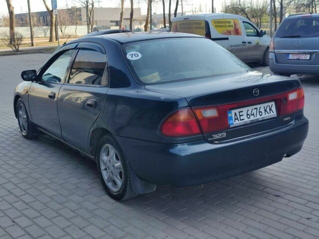 Синій Мазда 323, об'ємом двигуна 1.5 л та пробігом 399 тис. км за 1500 $, фото 8 на Automoto.ua