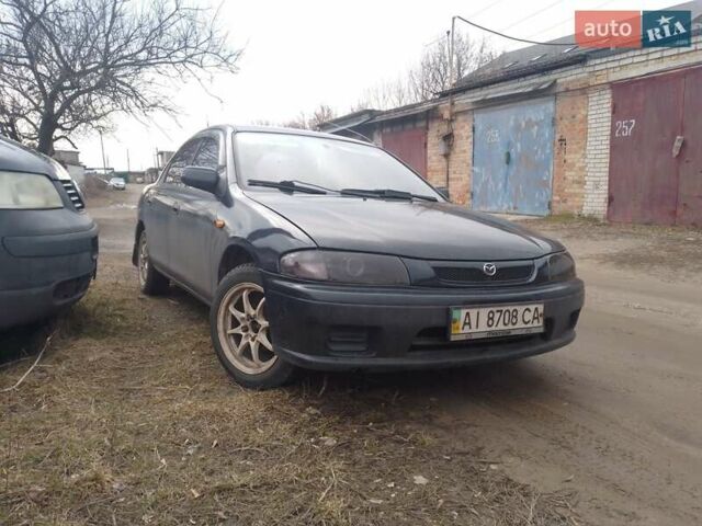 Синій Мазда 323, об'ємом двигуна 1.5 л та пробігом 309 тис. км за 2750 $, фото 5 на Automoto.ua