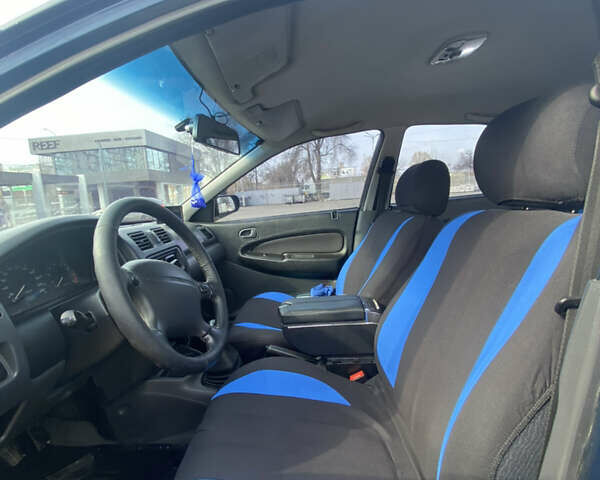 Синий Мазда 323, объемом двигателя 1.5 л и пробегом 330 тыс. км за 3000 $, фото 5 на Automoto.ua