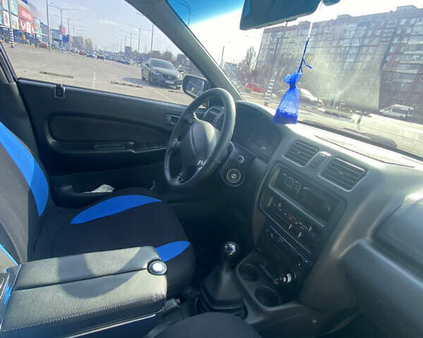 Синий Мазда 323, объемом двигателя 1.5 л и пробегом 330 тыс. км за 3000 $, фото 14 на Automoto.ua