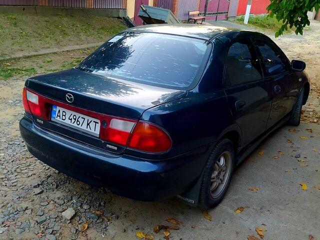 Синій Мазда 323, об'ємом двигуна 1.5 л та пробігом 0 тис. км за 1500 $, фото 2 на Automoto.ua