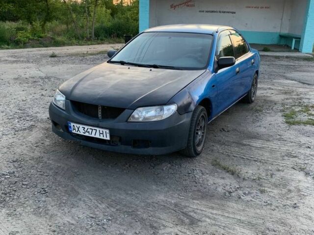 Синий Мазда 323, объемом двигателя 1.8 л и пробегом 275 тыс. км за 784 $, фото 3 на Automoto.ua