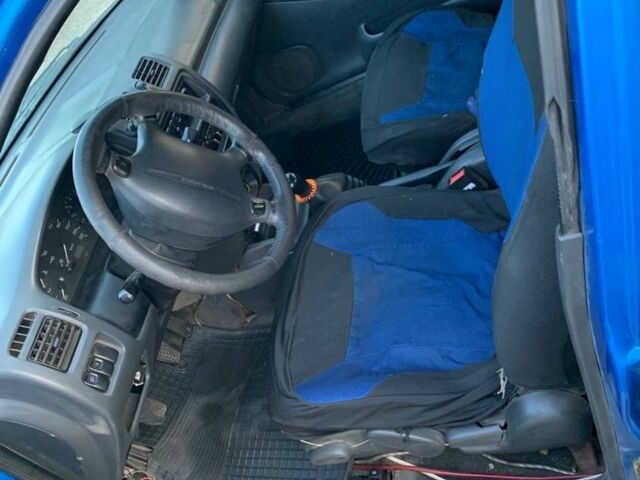 Синий Мазда 323, объемом двигателя 1.8 л и пробегом 275 тыс. км за 784 $, фото 6 на Automoto.ua