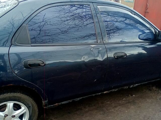 Синий Мазда 323, объемом двигателя 1.5 л и пробегом 500 тыс. км за 1500 $, фото 4 на Automoto.ua