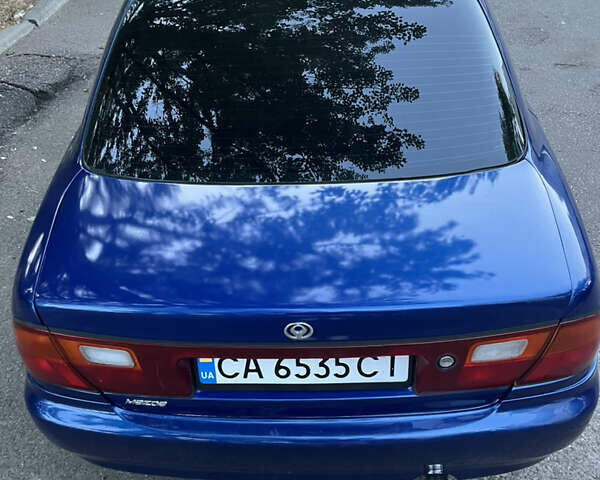 Синий Мазда 323, объемом двигателя 1.49 л и пробегом 339 тыс. км за 2300 $, фото 7 на Automoto.ua