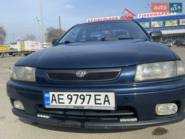 Синий Мазда 323, объемом двигателя 1.5 л и пробегом 330 тыс. км за 3000 $, фото 15 на Automoto.ua