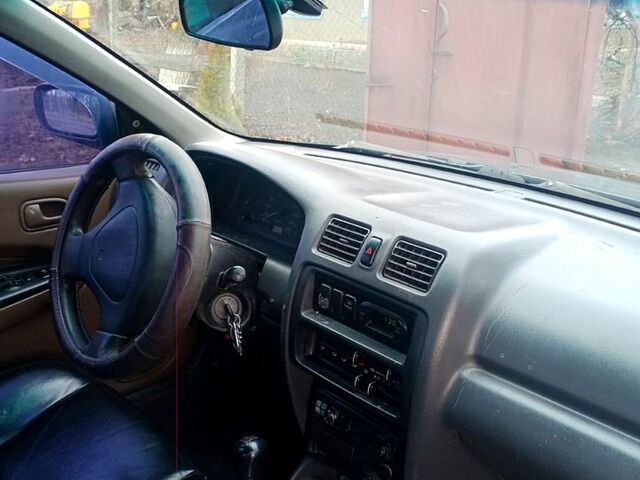 Синий Мазда 323, объемом двигателя 1.5 л и пробегом 500 тыс. км за 1500 $, фото 2 на Automoto.ua