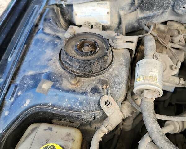 Синій Мазда 323, об'ємом двигуна 1.5 л та пробігом 345 тис. км за 1000 $, фото 6 на Automoto.ua