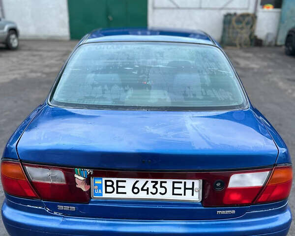 Синий Мазда 323, объемом двигателя 1.5 л и пробегом 330 тыс. км за 2200 $, фото 4 на Automoto.ua